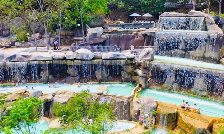 Private Full Day Explore Jumping Cliff Waterfall and Relax At Hot Spring Center