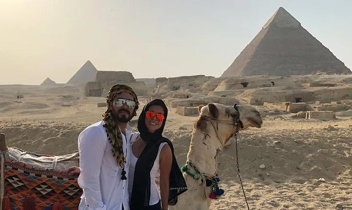 Cairo layover tour Giza pyramids Egyptian museum local bazaars Camel ride Lunch