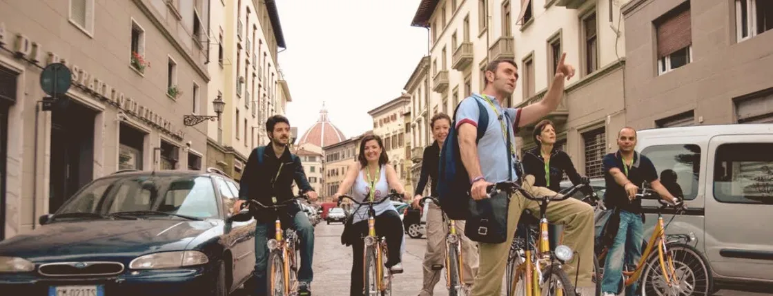 Audio guided bike tour led by a tour leader