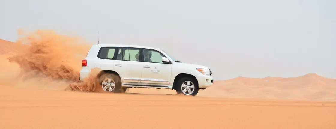 An Evening Desert Safari with Dinner and Live Entertainment