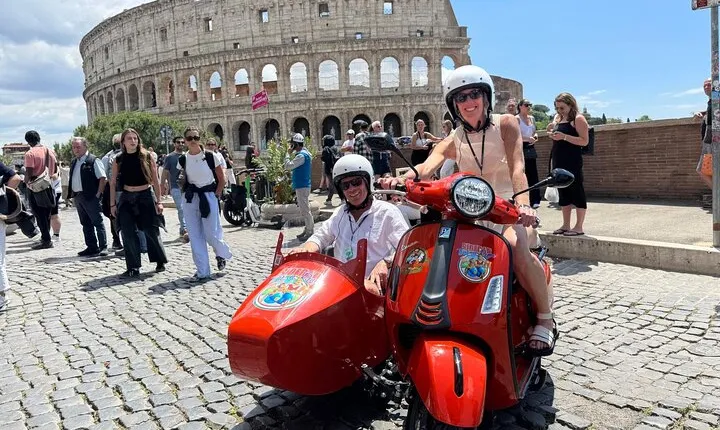 Explore Rome like Emily in a Vintage Vespa Sidecar Adventure