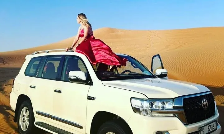Private Morning Safari Camel Ride, Dune Bashing and Sandboarding