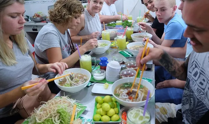 Saigon After Dark and Street Food by Motorbike and Scooter