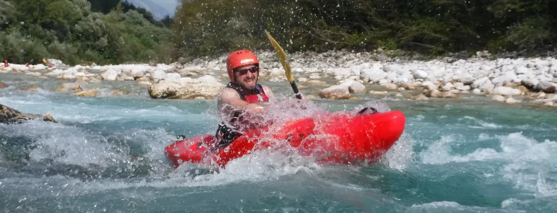 Whitewater kayak course on the Soca River from Bovec