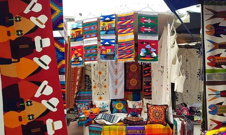 Otavalo Market & Peguche Falls Tour with Bizcochos – From Quito