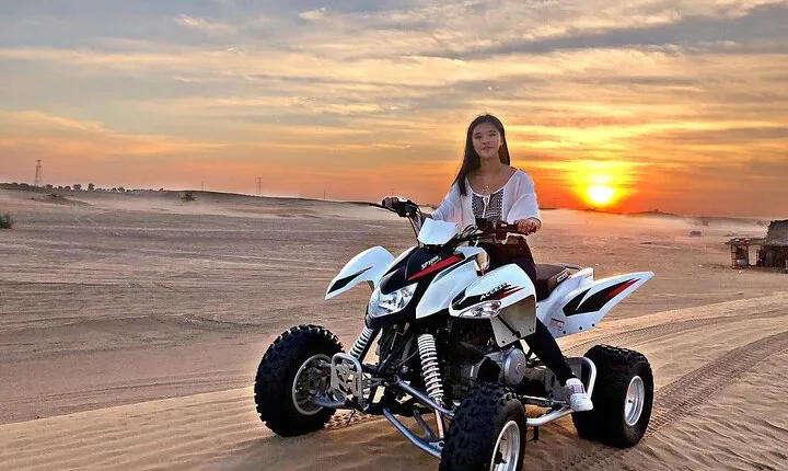 1-Hour Quad Bike Adventure: BBQ Dinner, Sandboarding & Shows!