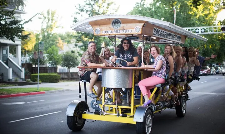 Pedal, Drink, and Bar hop through Sacramento on a 15 seat Beer Bike