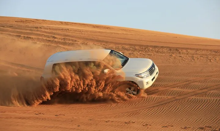 Abu Dhabi: Desert Safari with Dune Bashing, SandBoarding & BBQ