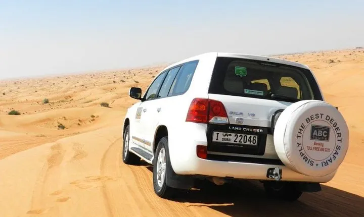 Dubai Desert 4x4 Dune Bashing morning safari, Camel Ride, Sandboarding and lunch