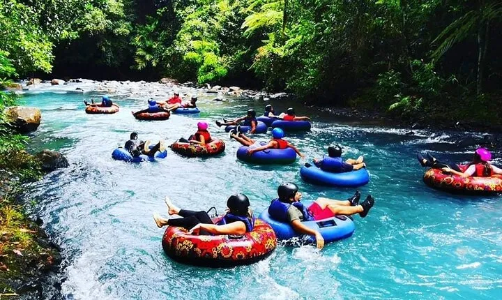 3 in 1, zipline over blue river, tubing on blue river and sloths