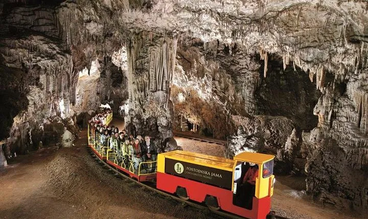 Postojna Cave and Predjama Castle from Sistiana