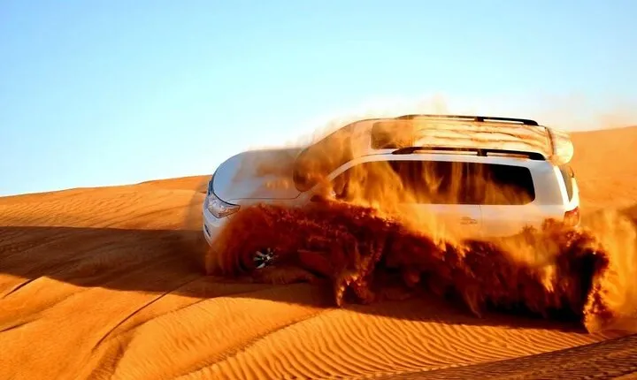 Morning Desert Safari with Sandboard and Camel Ride