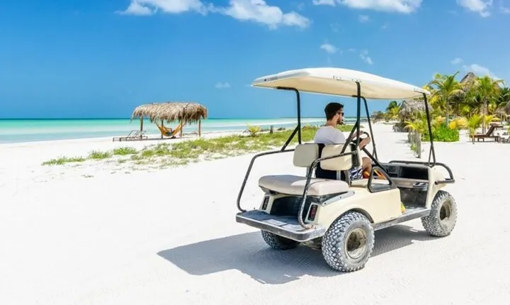 Holbox Island Tour Golf Cart Ferry with Lunch and Transportation