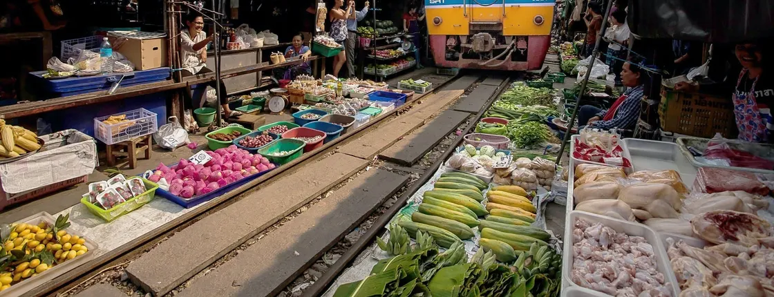 Damnoen Saduak Floating & Maeklong Railway Markets Tour