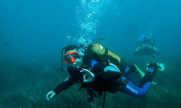 Baptism of diving from boat