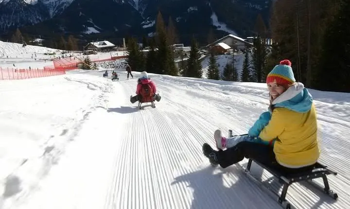 The most famous sledge slope in the Dolomites and a panoramic tour by car
