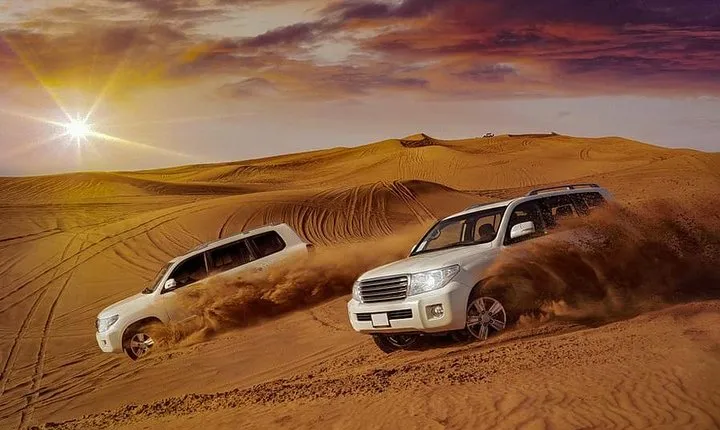 Evening Desert Safari with Camel Ride, BBQ Dinner and Dune Bashing