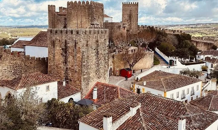 Lisbon: Tour to Fatima, Battle, Nazareth and Obidos (proof of ginja)!