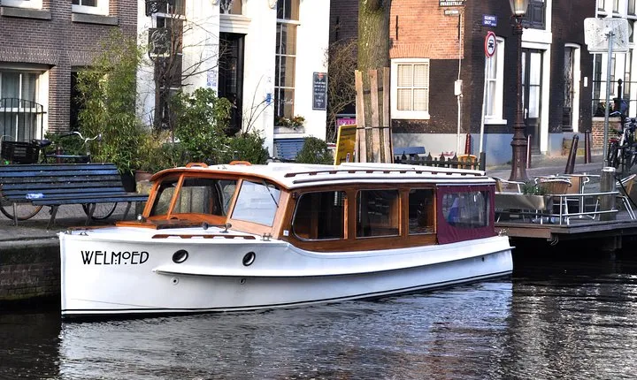 Private Guided Historic Amsterdam Canal Cruise in a Salon Boat