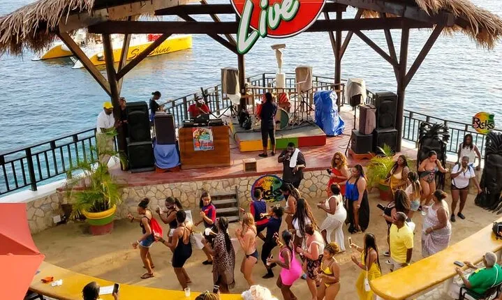 Private Tour to 7 Mile Beach Ricks Cafe with ATV from Montego Bay