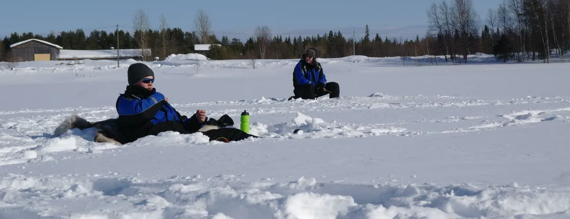Ice fishing trip from Levi to Kivijärvi by snowmobile