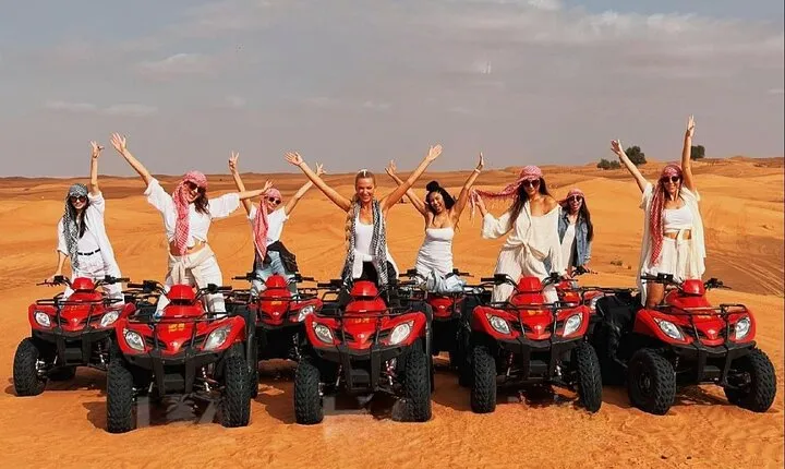 Desert Quad Biking Tour and Sand Boarding with Dinner in Dubai