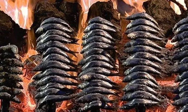 Sardines On Skewers Show Cooking in Malaga beach