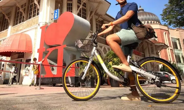 Cycling Through the Heart of Kuala Lumpur with Hotel Pickup