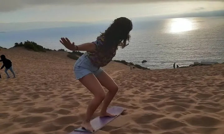 Sandboarding and sunset in Concón
