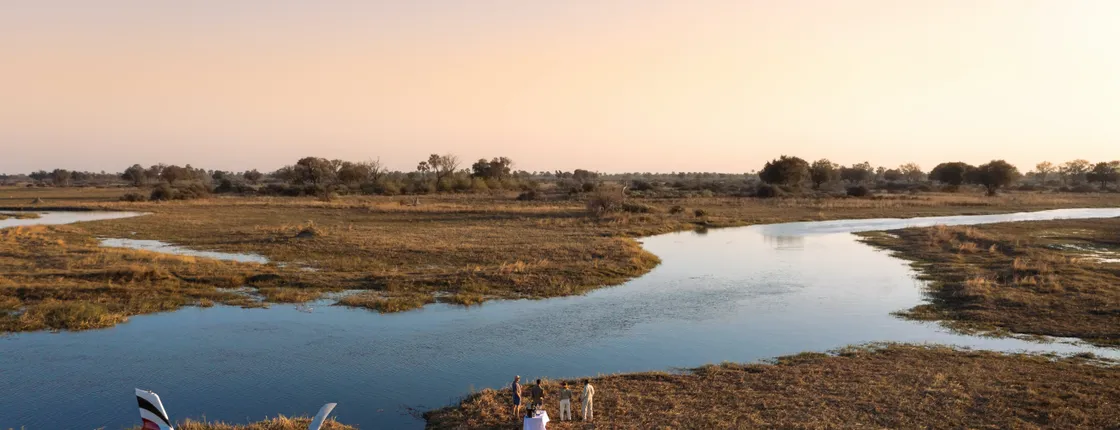 Okavango Delta private helicopter tour with gin & tonic bush stop