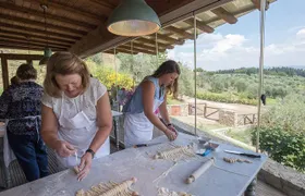 Cooking Class and Lunch at a Tuscan Farmhouse with Local Market Tour from Florence
