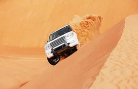 Desert Safari Red Dunes with Camel Ride, Sandboard, BBQ and Shows