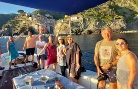 Sunset Cinque Terre Boat Tour with a traditional ligurian gozzo from Monterosso