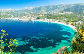 Himare cruise along beaches and caves with snorkel stops