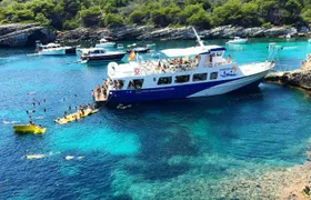 South-west Menorca cruise with paella lunch and Transfer