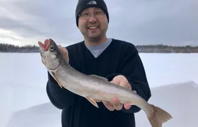 Fairbanks Ice Fishing Expedition in a Heated Cabin with Fish Cookout
