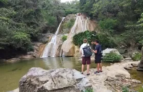 Natural adventure with waterfalls, trails and sunny day