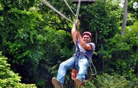 Cave Tubing and Zipline Adventure (Boat Transfer)