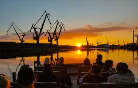 Sunset on the shipyard and old town cruise in Gdansk