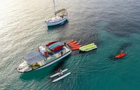 Boat tour with tapas, open bar and water sports in Ibiza