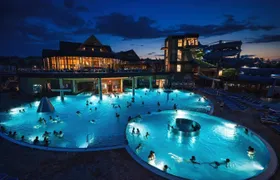 Snowmobile or quad ride and thermal pools day trip from Zakopane