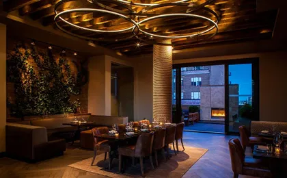Royalton Park Avenue _ ROOFTOP_ Park Ivy Lounge Table Setup Fireplace