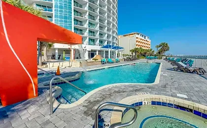 Amazing Beachfront Condo with Nice Hot tub & Pools