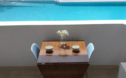 Spotless south facing apartment with pool view and WIFI heart of Las Americas