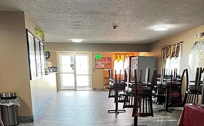 Designer Inn and Suites