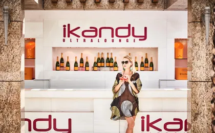 Woman by the ikandy Bar