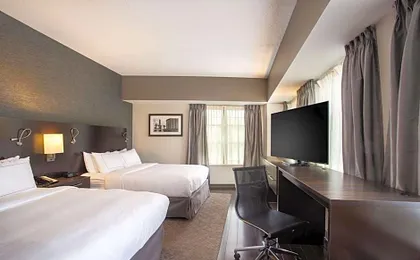 The Mosey Buffalo Williamsville, Tapestry Collection by Hilton
