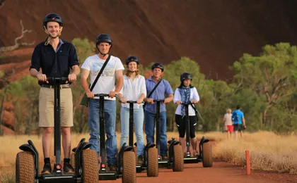 Quarter Uluru self-balancing scooter and sunset