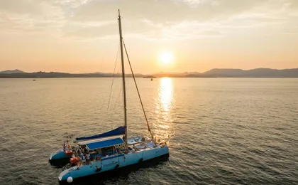 Adults-only Corfu sunset catamaran cruise with drinks, dinner and optional transfers