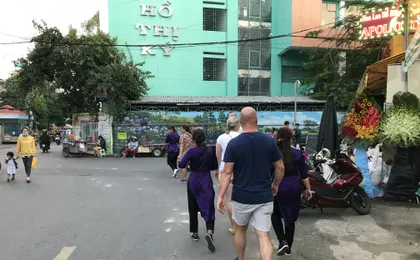 Ho Chi Minh City scooter food tour by night with a local host